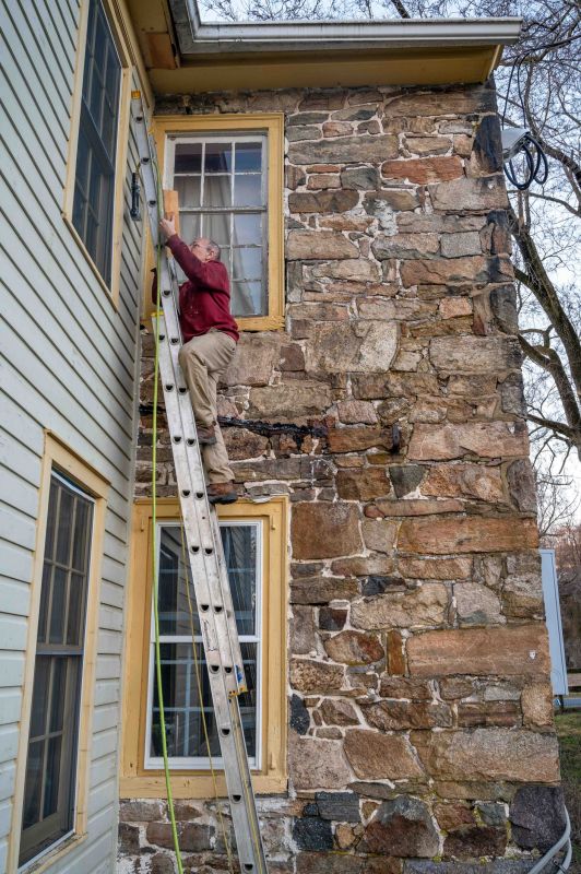 Local Brick Veneer Replacement pros at work